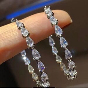 9.25 Silver& White topaz Teardrop Earrings